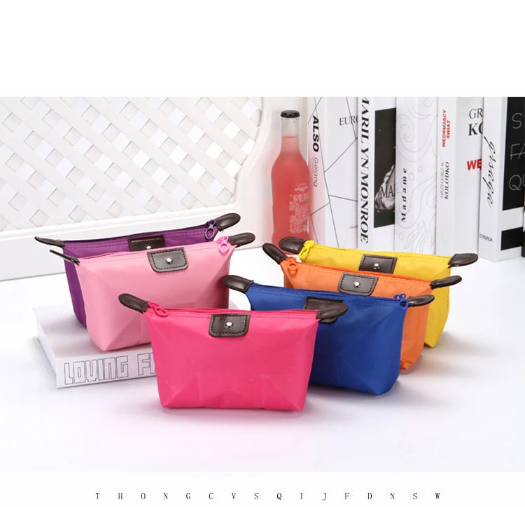 Nueva bolsa de cosméticos cómoda y bonita, bolsa de cosméticos de nailon con forma de bola de masa, bolsa de baño de almacenamiento impermeable