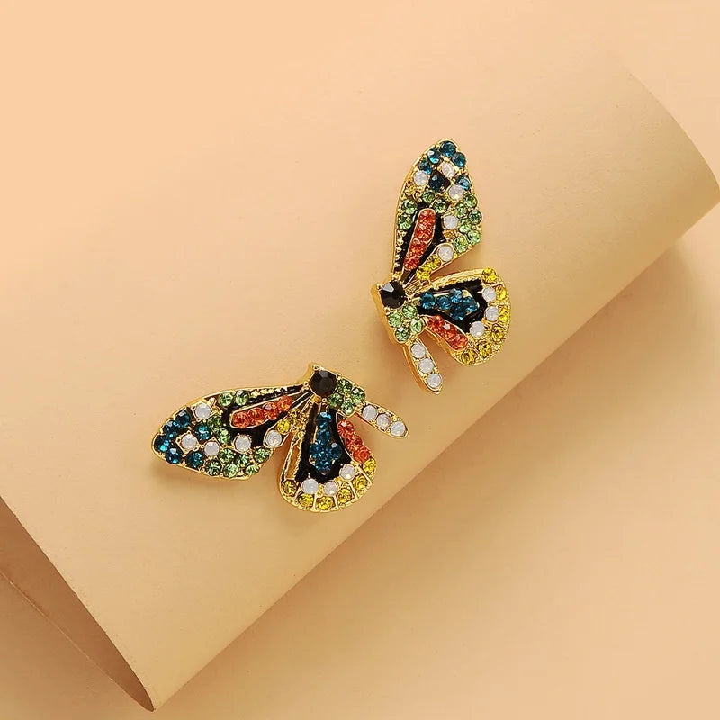 Delysia King - Pendientes con forma de mariposa de cristal de colores para mujer, aretes con temperamento elegante y moderno