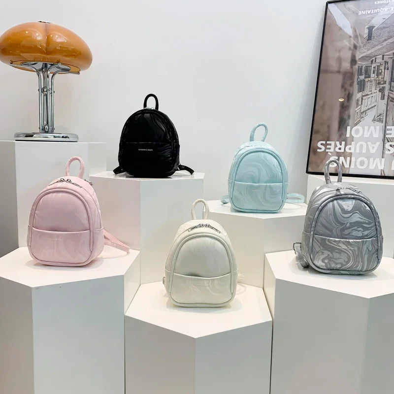 Mochilas de moda con cremallera sólida de PU con compartimento interior para viajes diarios, bolsos para damas en oferta 2024, mochilas de moda exquisitas