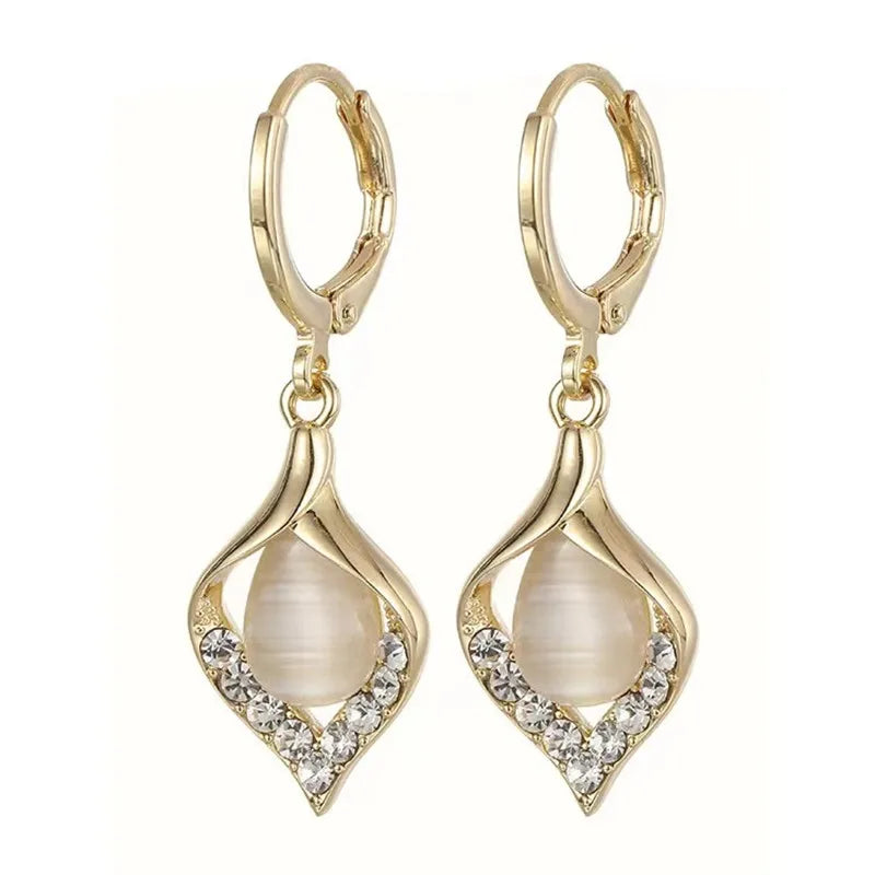 Pendientes elegantes de circonita brillante de tendencia coreana para mujer, pendientes de piedra de ojo de gato con luz de luna verde blanca, regalos de joyería para fiestas